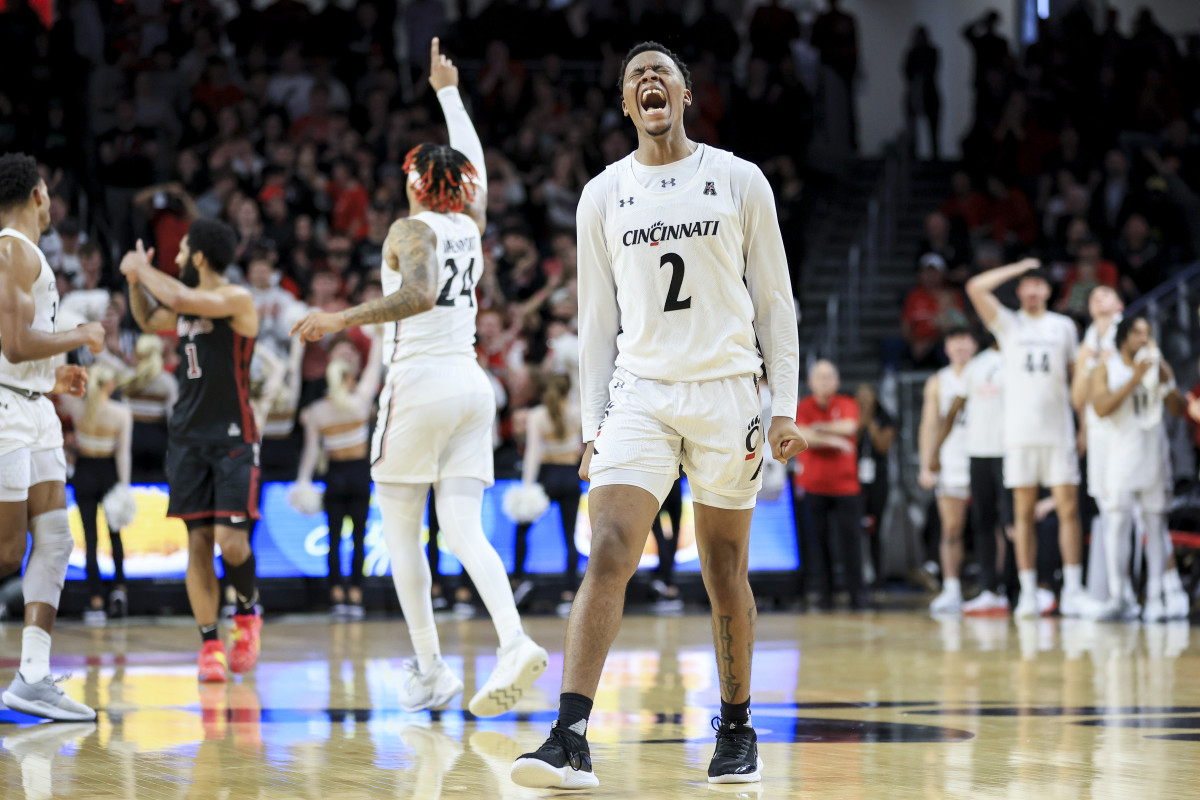 Feb 22, 2023; Cincinnati, Ohio, USA; Cincinnati Bearcats guard Landers Nolley II (2) reacts after making a basket in the game against the Temple Owls in overtime at Fifth Third Arena. Mandatory Credit: Aaron Doster-USA TODAY Sports